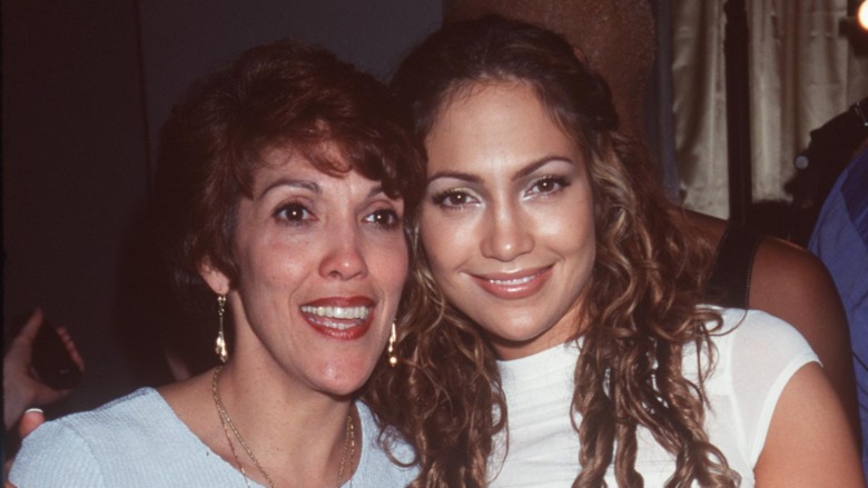 Jennifer Lopez and Lupe Lopez smiling