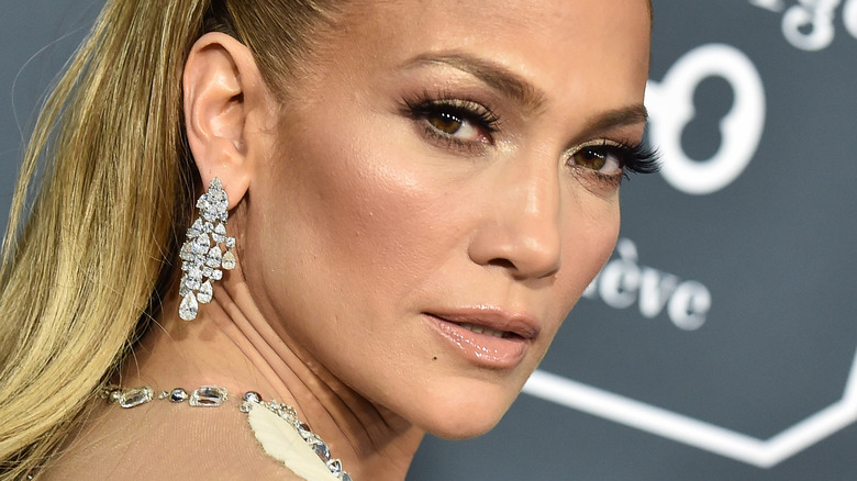 Jennifer Lopez looks over shoulder