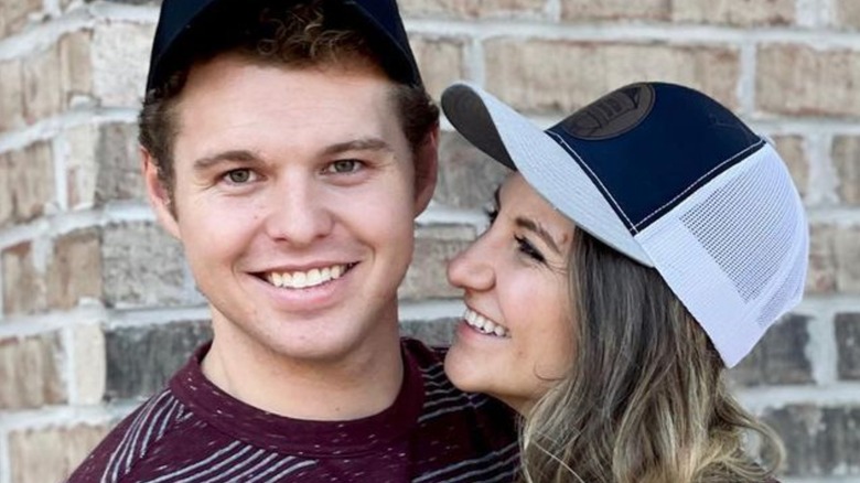 Jeremiah Duggar posing with Hannah Duggar