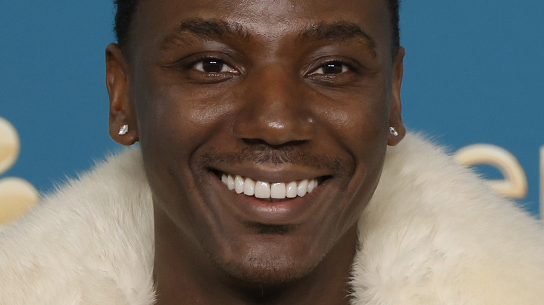 Jerrod Carmichael wearing white fur