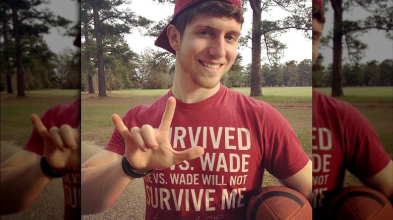 Ben Seewald holding football