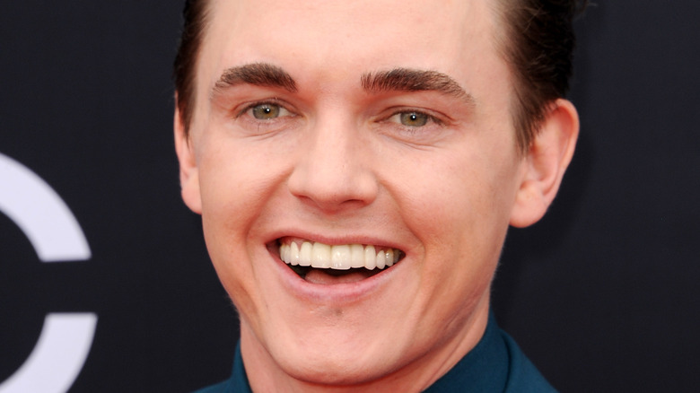 Jesse McCartney smiles on the red carpet