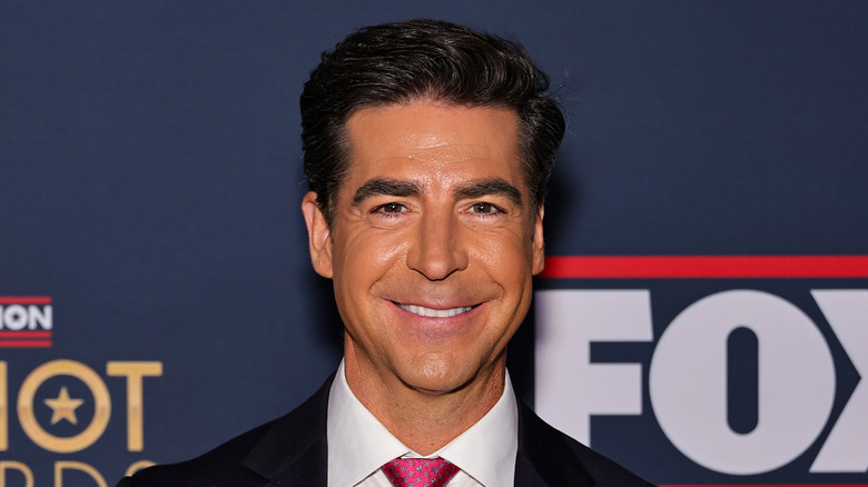 Jesse Watters smiling on the red carpet