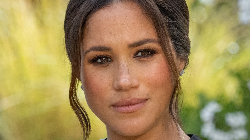 Meghan Markle staring