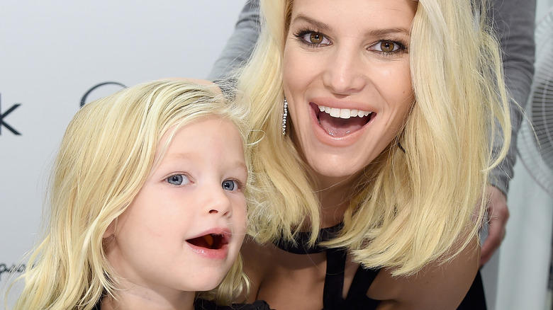 Maxwell Drew, Jessica Simpson posing