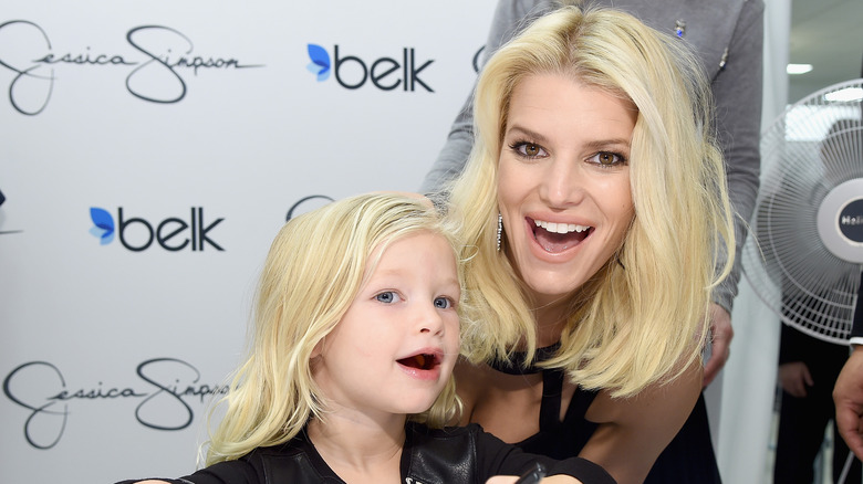 Maxwell Drew Johnson and Jessica Simpson posing