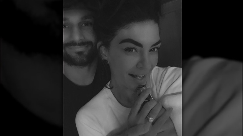Jessica Szohr and Brad Richardson smiling