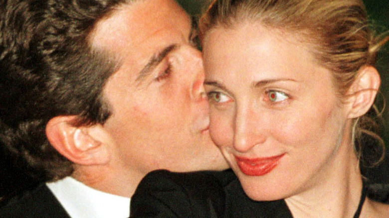 JFK Jr. kisses Carolyn Bessette