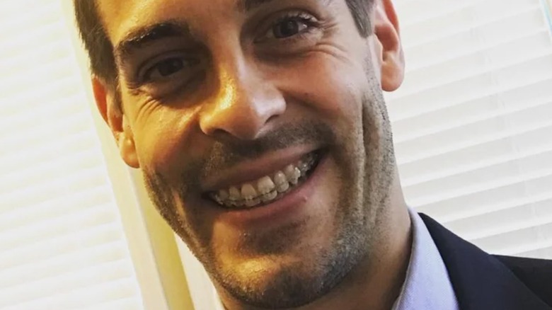 Derick Dillard smiles with braces