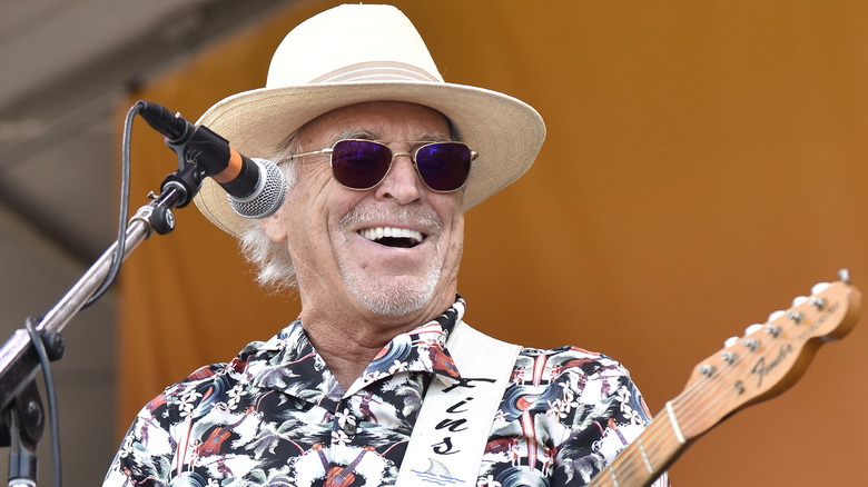 Jimmy Buffett performing on stage