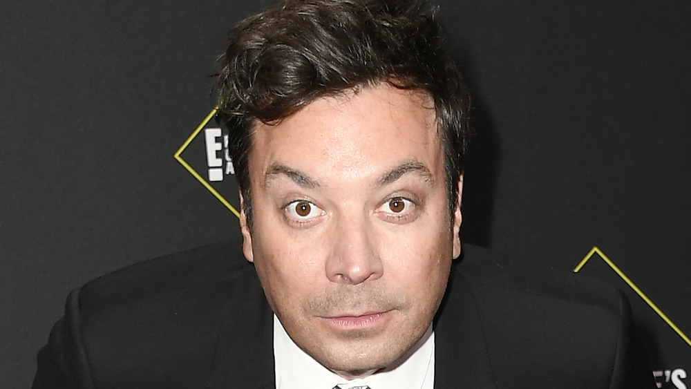 Jimmy Fallon posing on a red carpet