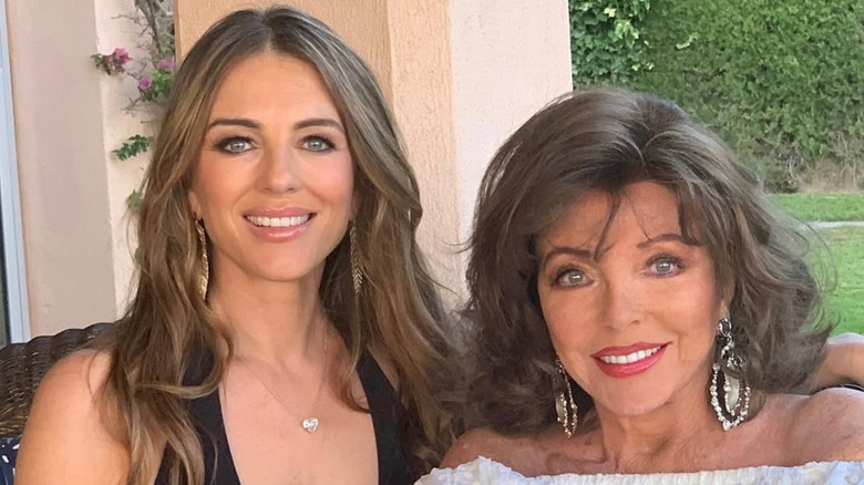 Elizbeth Hurley and Joan Rivers smiling