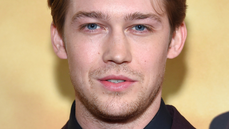 Joe Alwyn posing