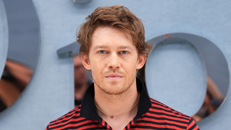 Joe Alwyn looking at the camera