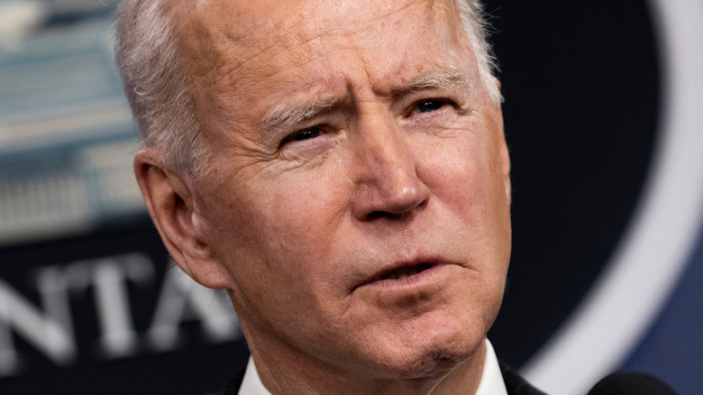 Joe Biden squinting eyes during speech