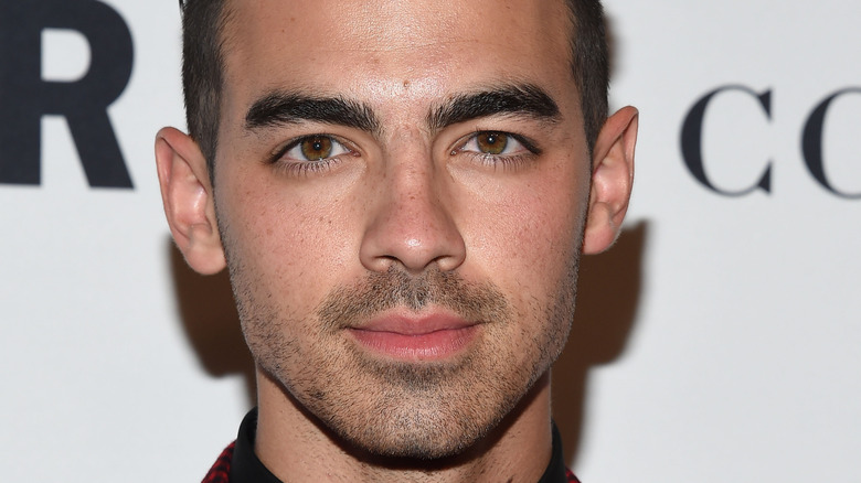 Joe Jonas not smiling