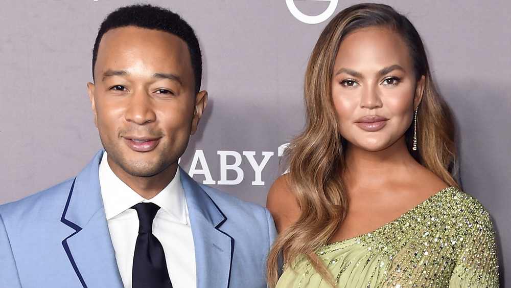 John Legend and Chrissy Teigen smiling