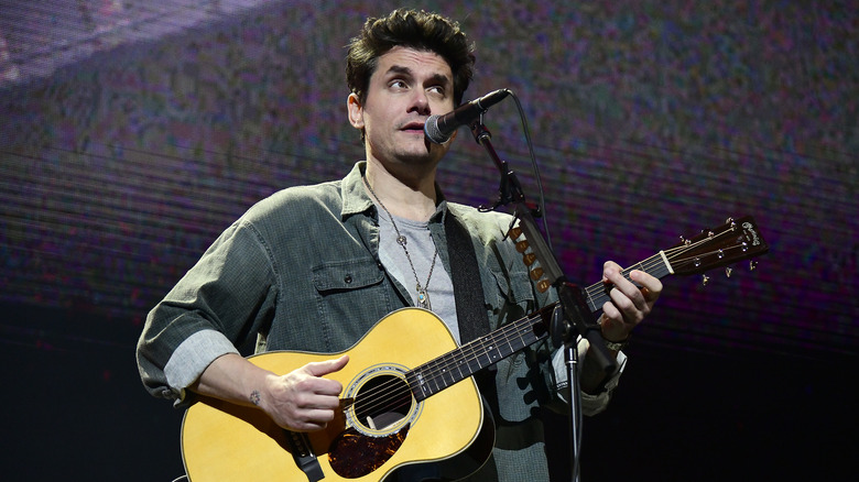 John Mayer playing guitar
