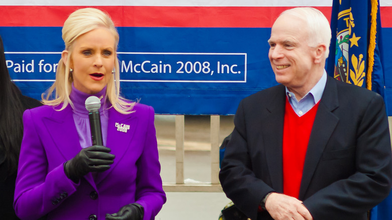 Cindy McCain and John McCain speaking to supporters at a rally 