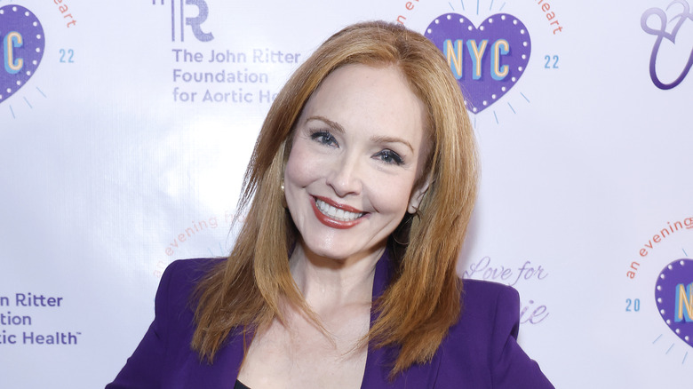 Amy Yasbeck wearing purple