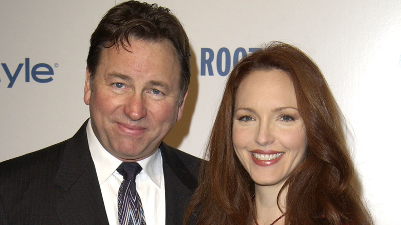 Amy Yasbeck and John Ritter posing