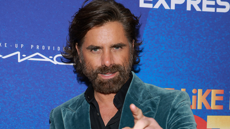 John Stamos pointing