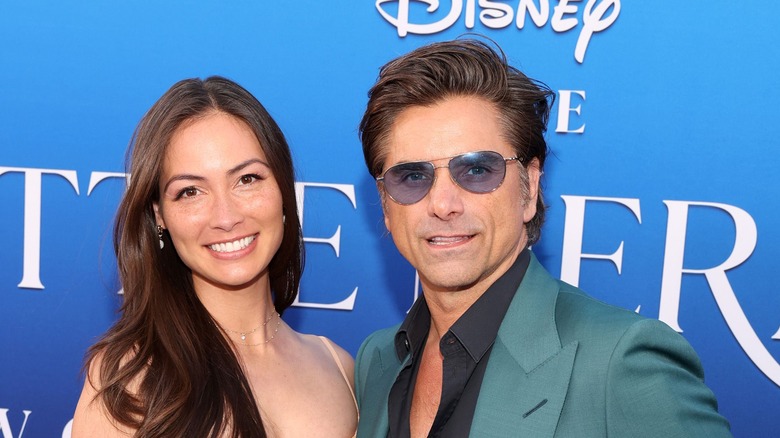 Caitlin McHugh, John Stamos posing