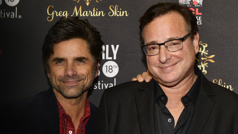 John Stamos and Bob Saget smiling in 2018