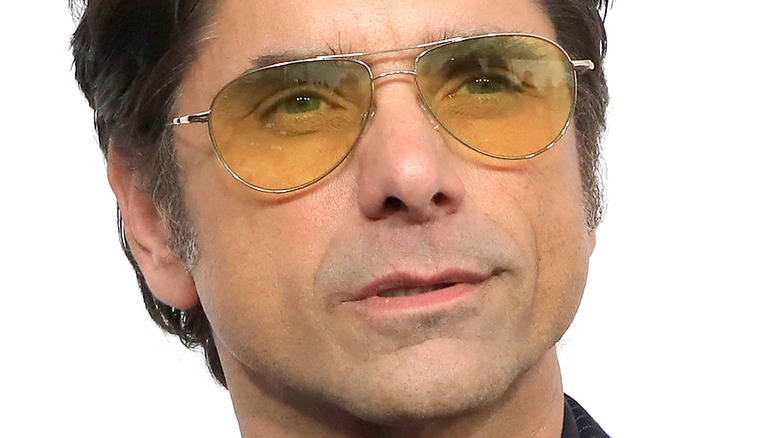 John Stamos on a red carpet