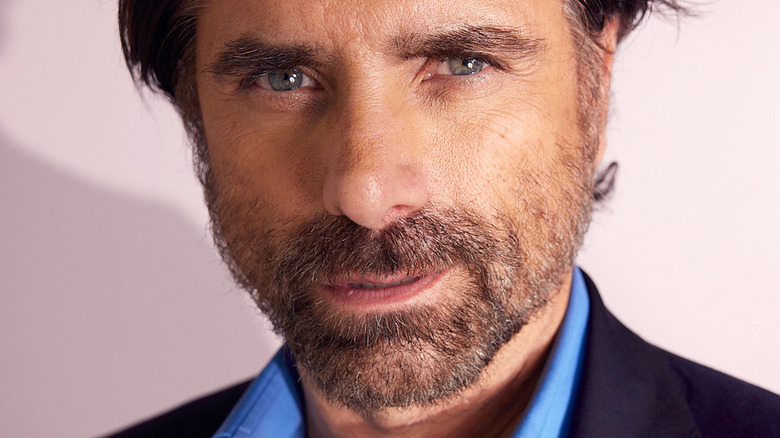 John Stamos with beard green eyes 