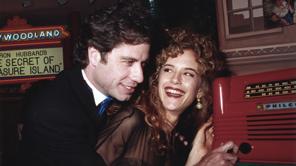 John Travolta and Kelly Preston attending the Church of Scientology Museum opening