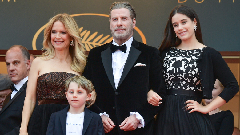 Kelly Preston, John Travolta, Ella Bleu Travolta and Ben Travolta pose together at the Cannes Film Festival.