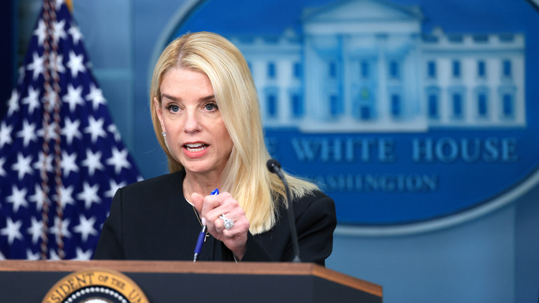 Pam Bondi's diamond ring is seen as she gesticulates while speaking in the briefing room in June 2025