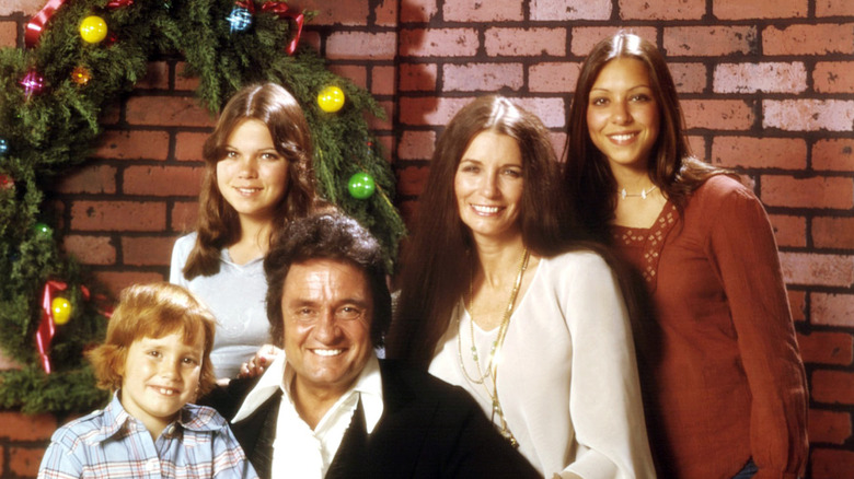 Johnny Cash and June Carter with three of their five children