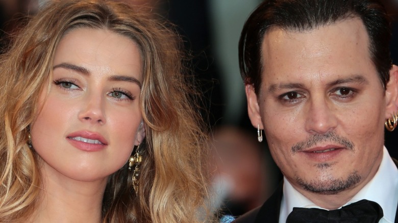 Amber Heard and Johnny Depp posing