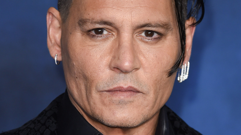 Johnny Depp attends a premiere