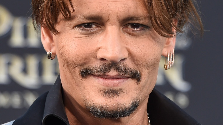 Johnny Depp smiles