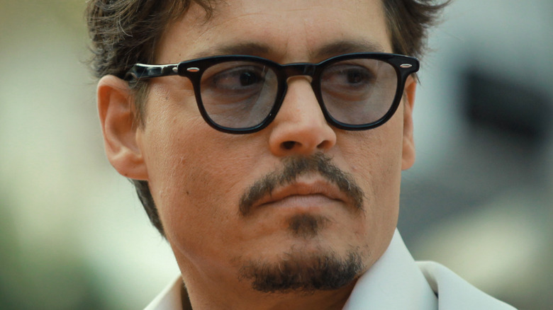 Johnny Depp black rimmed glasses goatee