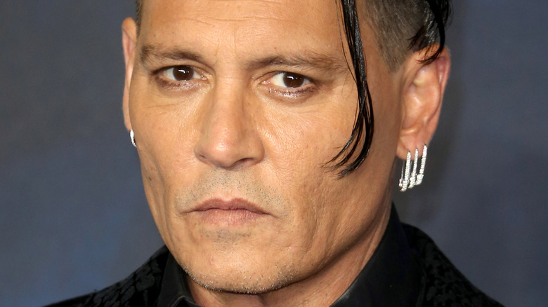Johnny Depp 2018 short hair and earring