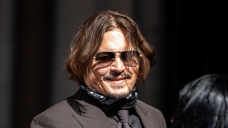 Johnny Depp in sunglasses leaves court in U.K. 2020