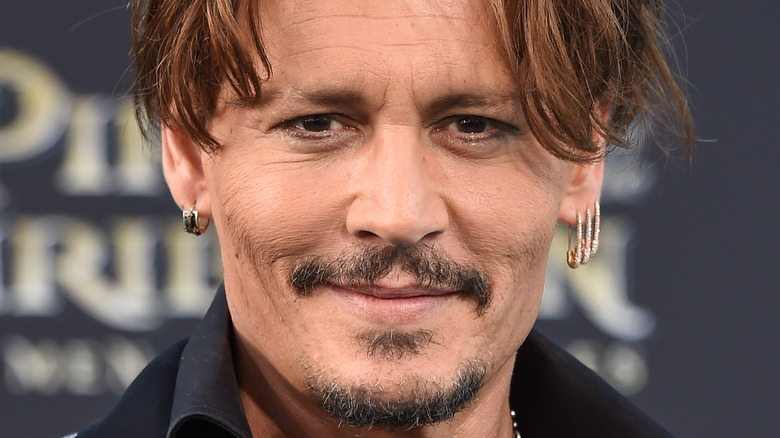 Johnny Depp smirking