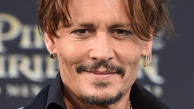 Johnny Depp poses for camera