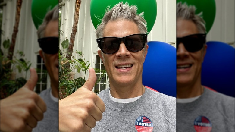 Johnny Knoxville posing with a thumbs up on election day in 2020.