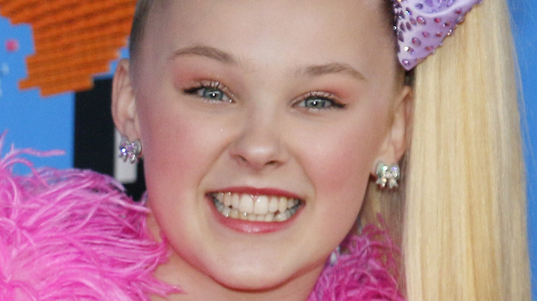 Jojo Siwa posing on red carpet 