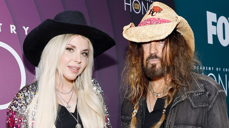 Firerose and Billy Ray Cyrus on the red carpet