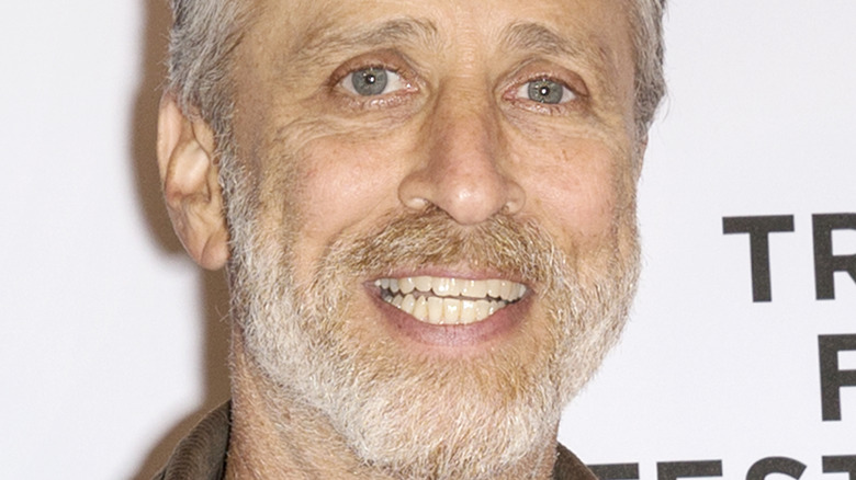 Jon Stewart smiling on red carpet