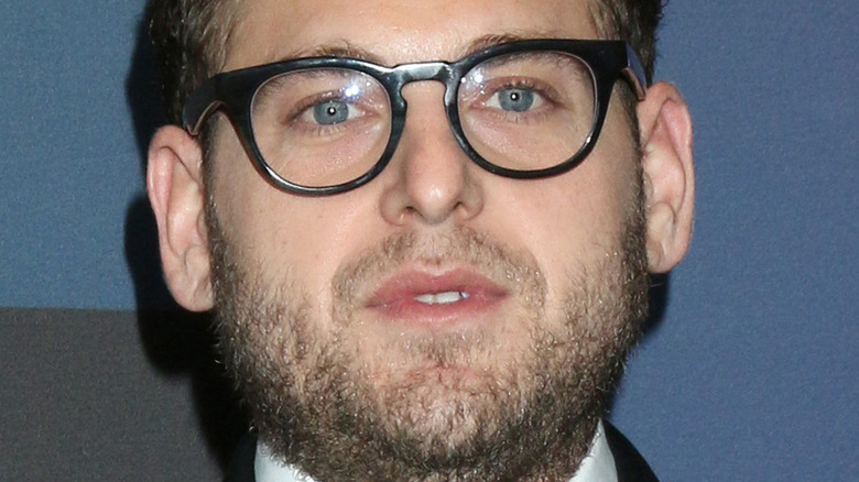 Jonah Hill posing in glasses