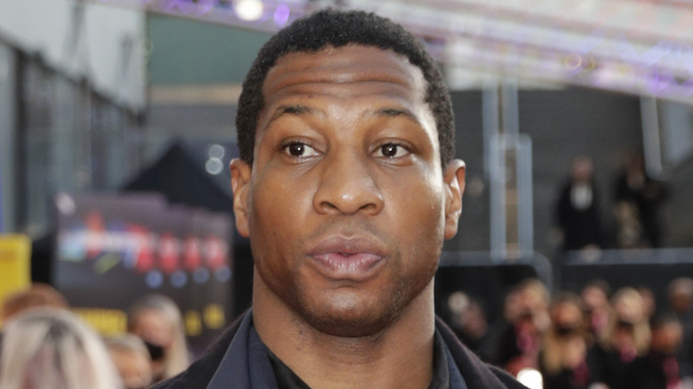 Jonathan Majors crowd background