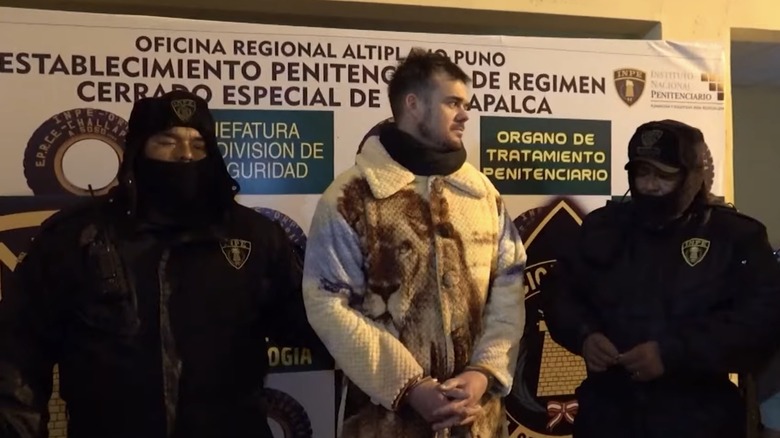 Joran van der Sloot in handcuffs