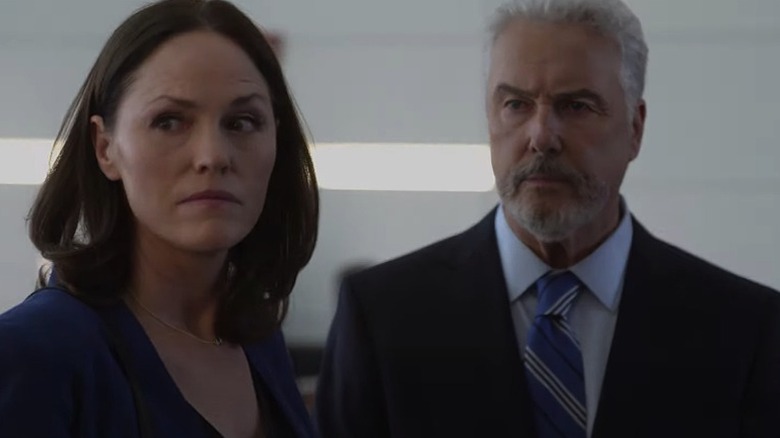 Grissom and Sidle in a courtroom 